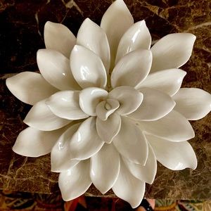 Creamy white ceramic flower. Could hang